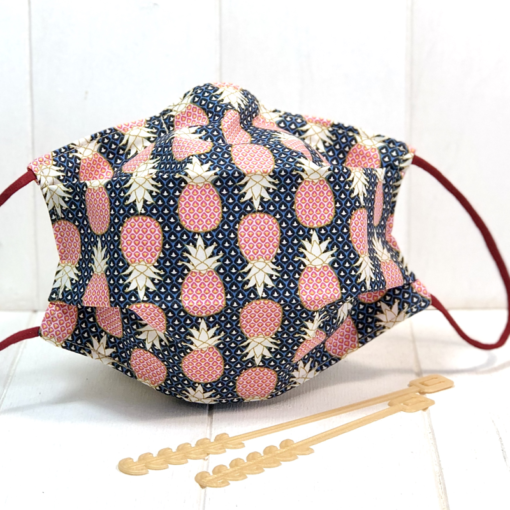 Masque tissu à plis adulte ananas avec 2 barrettes de maintien offertes